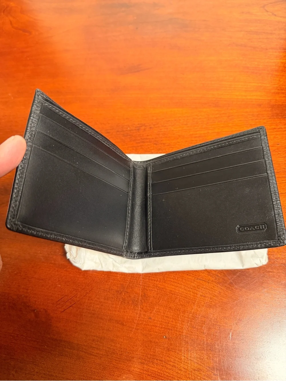 Coach Black Textured Leather Bi-Fold Wallet with Silver Coach Logo